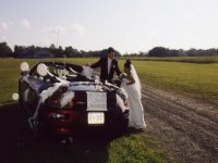 nontraditional bridal car red convertible