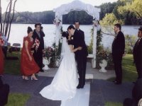 outdoor wedding ceremony first kiss