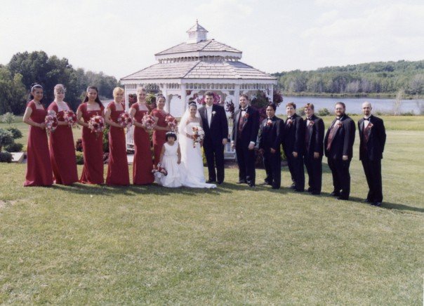 outdoor wedding entourage by the gazebo